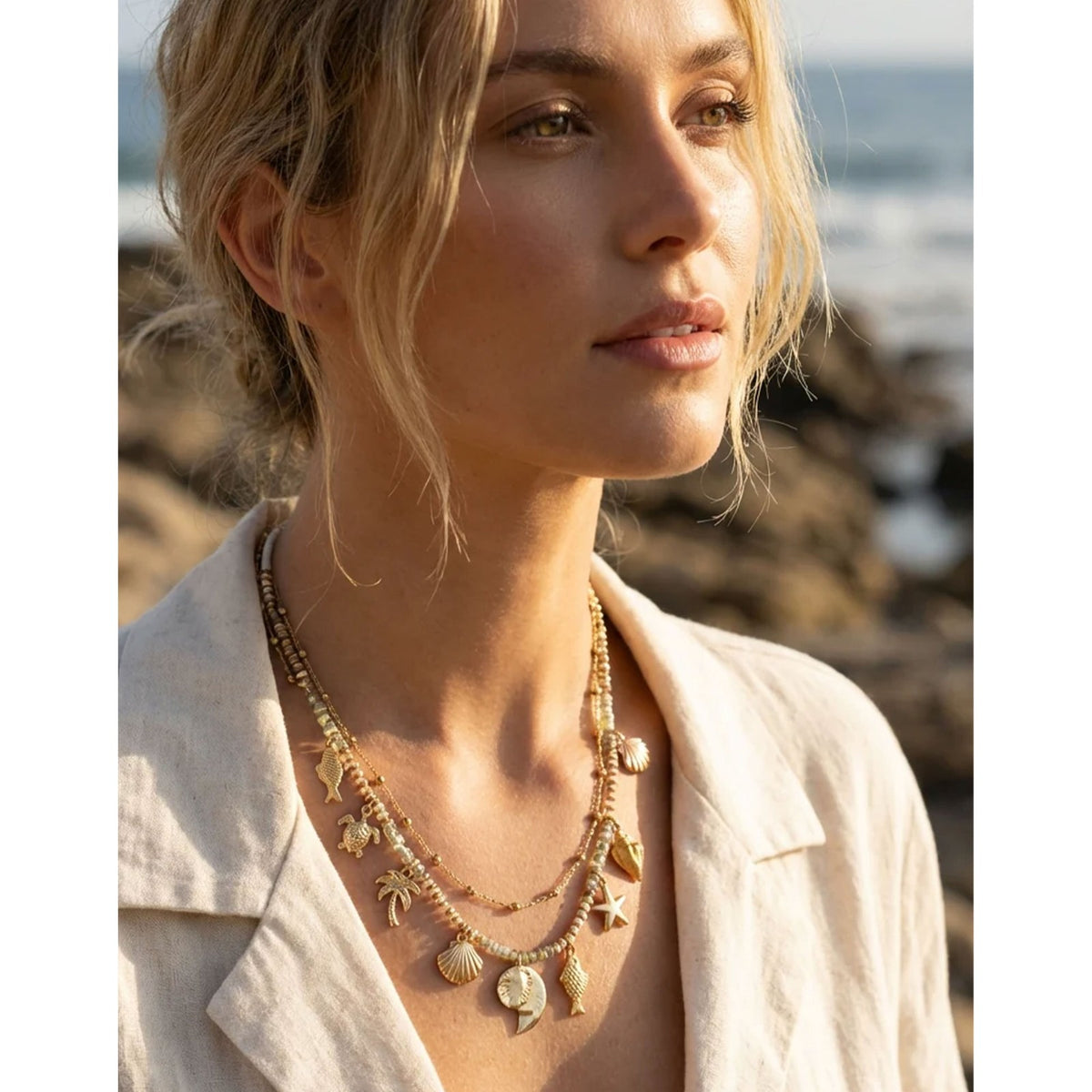 https://dknwnigc18uf4.cloudfront.net/product-media/U8I/1600/1600/sea-charm-necklace-.jpg