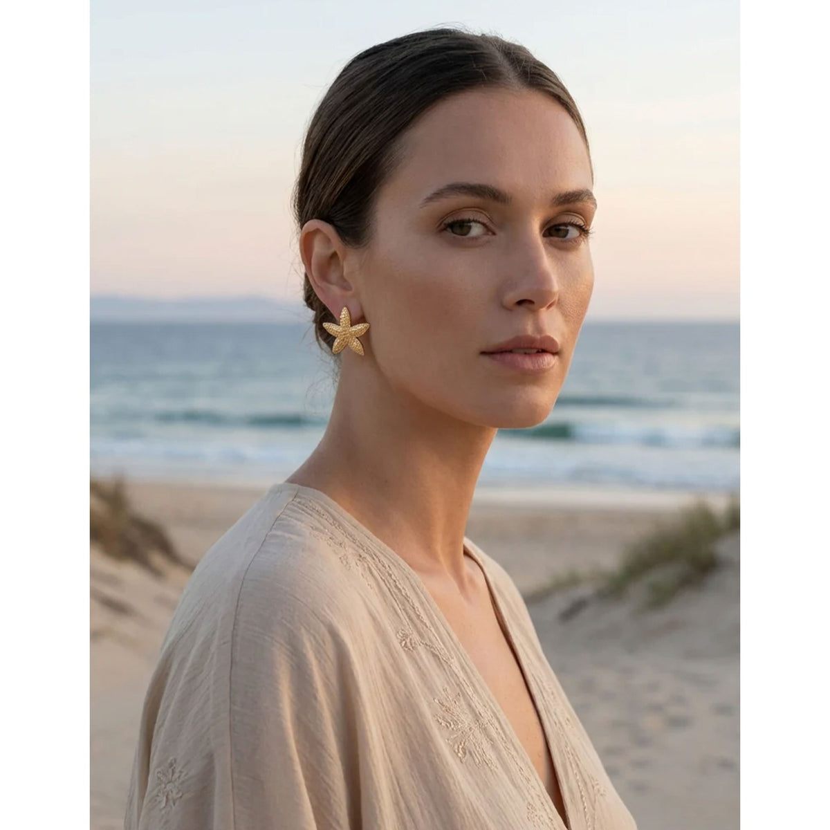 https://dknwnigc18uf4.cloudfront.net/product-media/U7A/1600/1600/starfish-earrings-.jpg