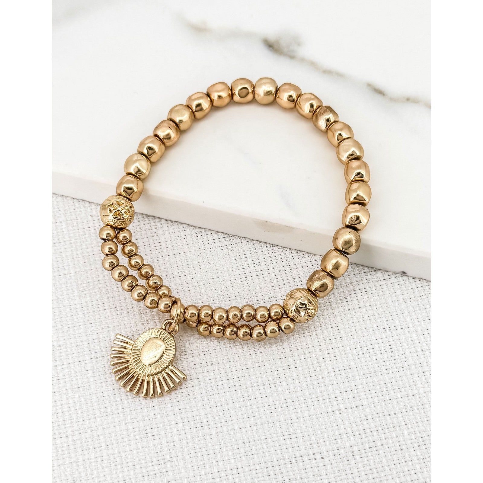 https://dknwnigc18uf4.cloudfront.net/product-media/TTR/1600/1600/sun-bracelet-.jpg