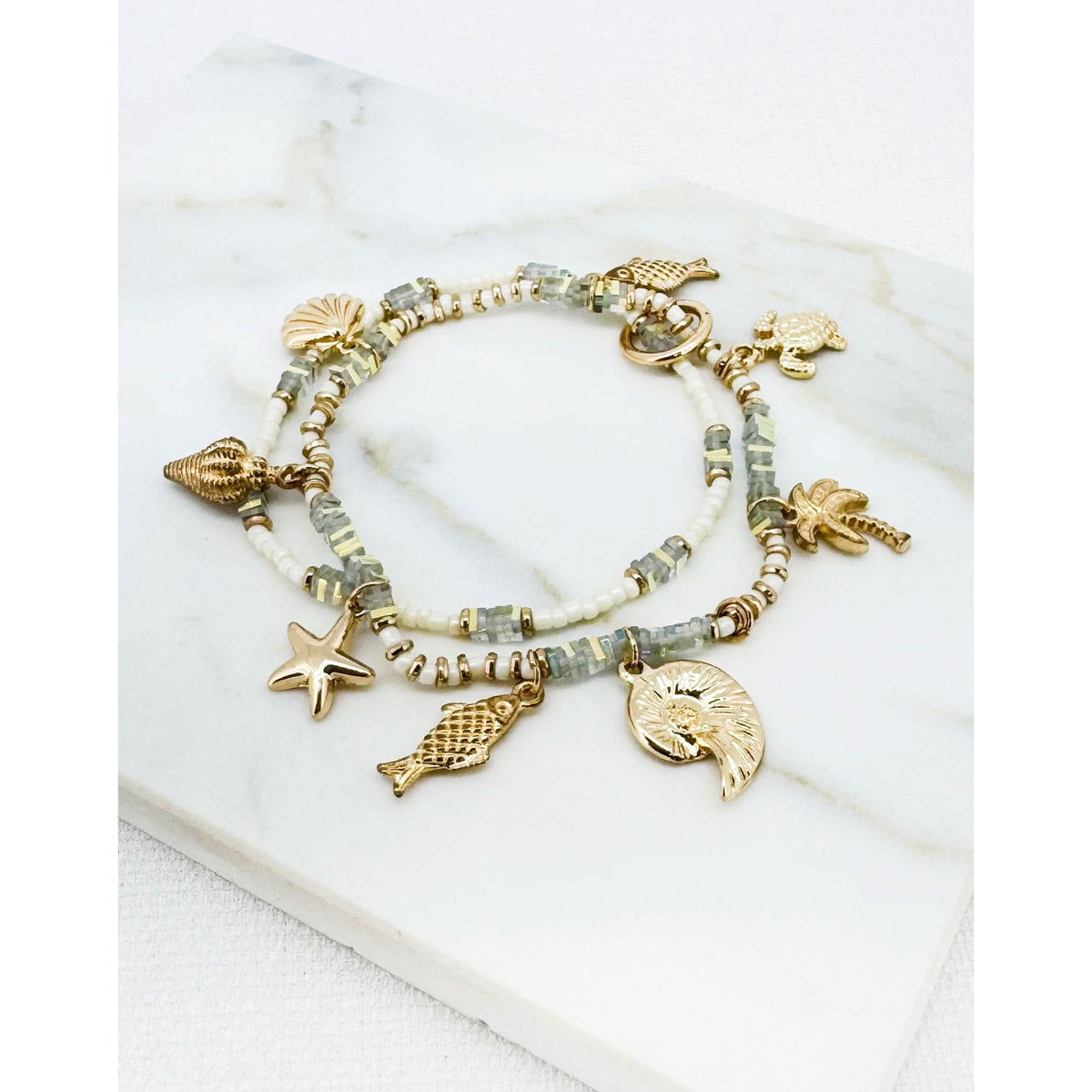 https://dknwnigc18uf4.cloudfront.net/product-media/U6U/1600/1600/sea-bead-bracelet-1.jpg