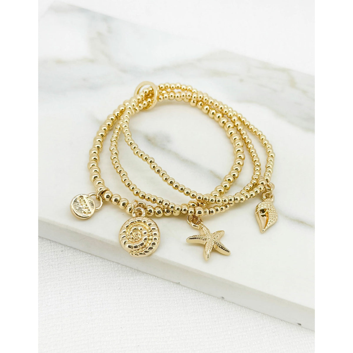 https://dknwnigc18uf4.cloudfront.net/product-media/U6T/1600/1600/sea-charm-braceket-2.jpg